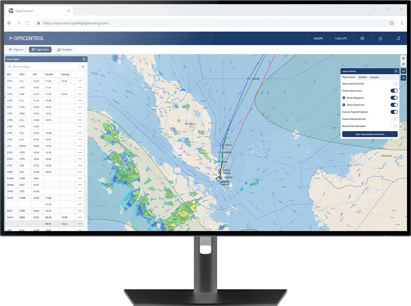 OpsControl interface displayed on a monitor, showing live flight tracking, route visualization, weather overlays, and active flight data.