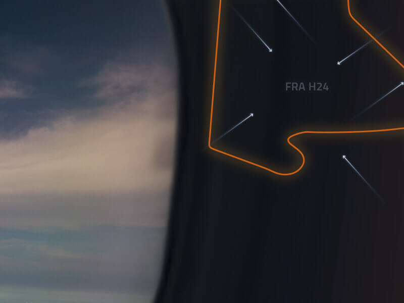 Aircraft wing view and FRA H24 airspace diagram showcasing AIR SUPPORT’s focus on free route airspace and efficiency.